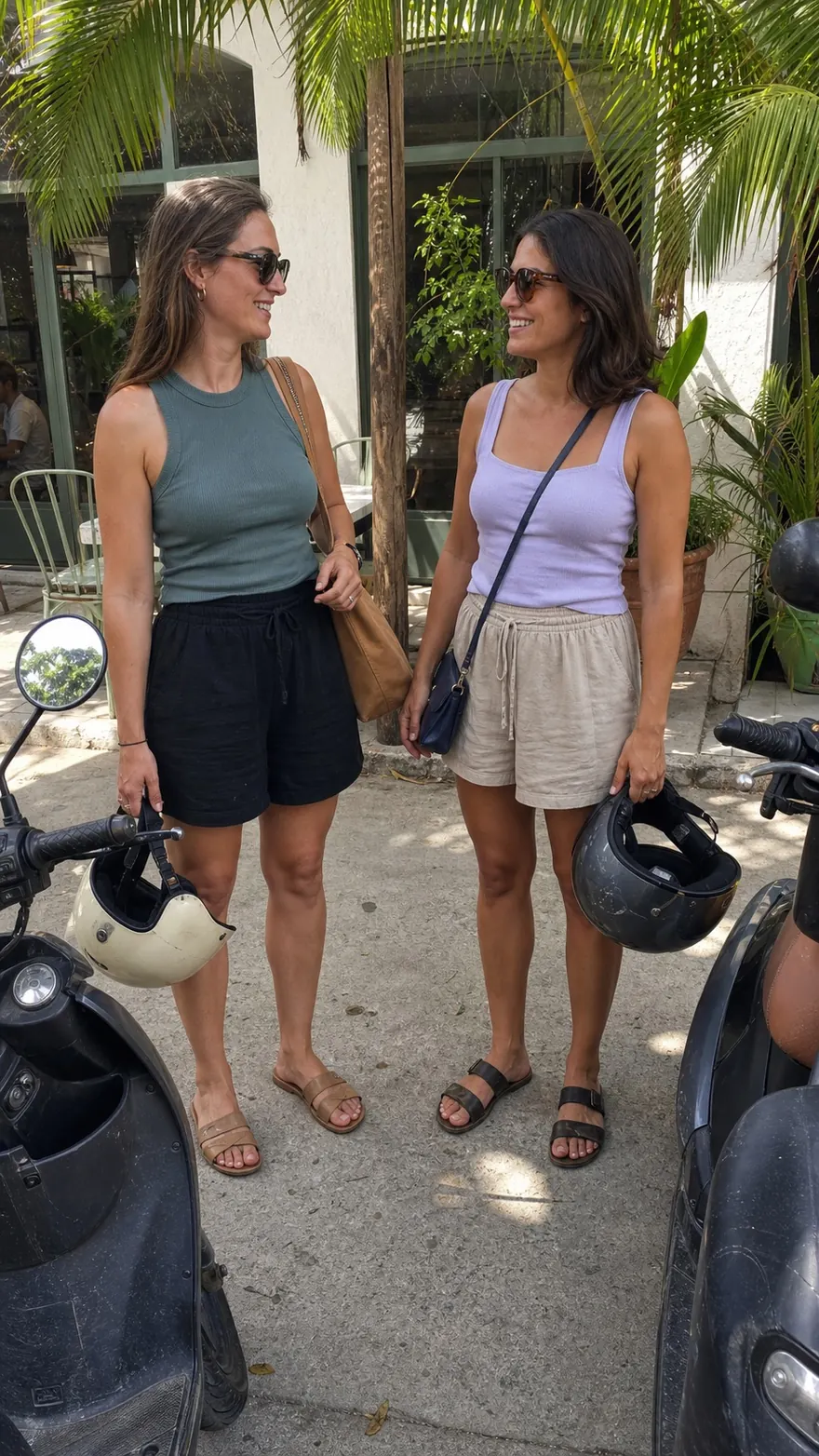 Café Sidewalk: Two friends outside a tropical café, scooters parked in front