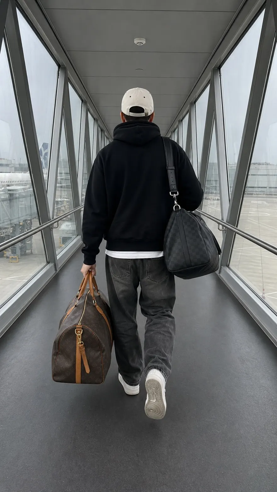 Jet Bridge Boarding: Down the jet bridge with monogram luggage in each hand