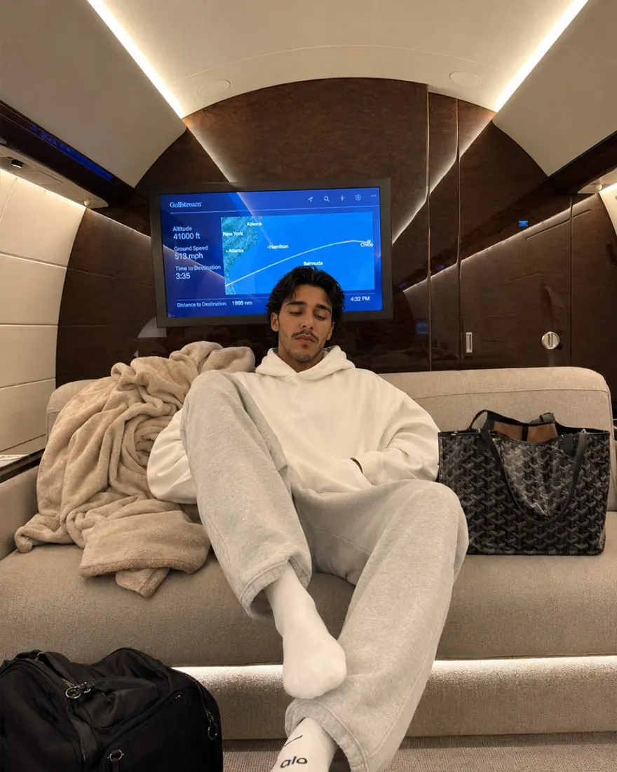 Private Jet Nap: Lounging mid-flight on a private jet at 41,000 ft