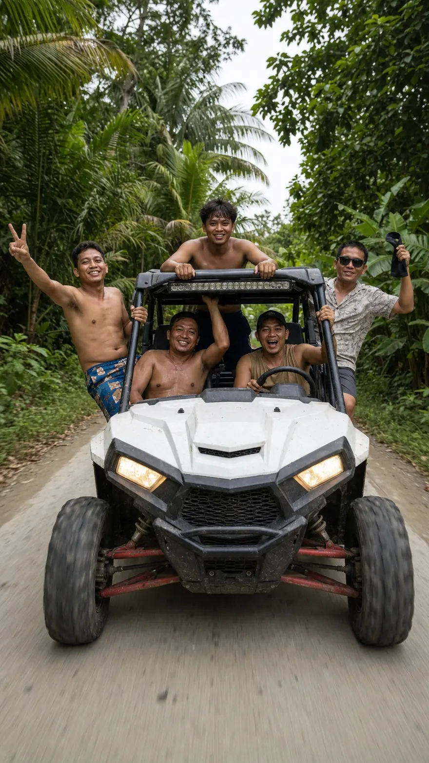 Jungle Buggy Crew: Five-up in a white side-by-side on a jungle road