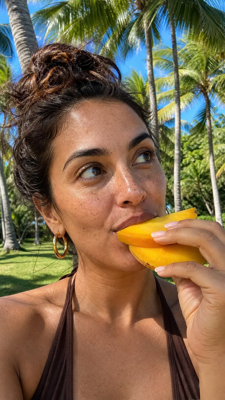 Mango Bite: Golden-hour close-up biting into a fresh mango slice