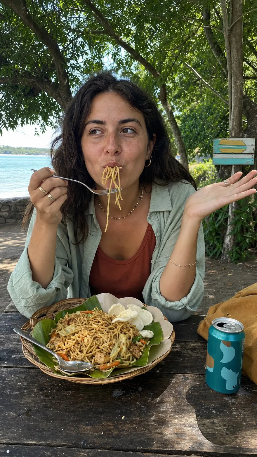 Noodle Picnic Table: Slurping noodles at a shoreline café table